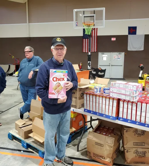 elderly man with cereal