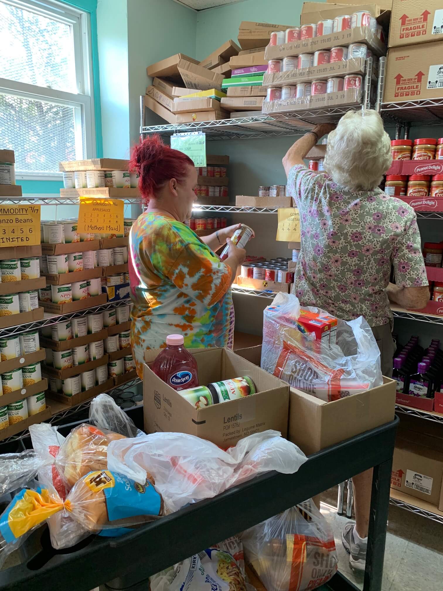 Stocking the food pantry store